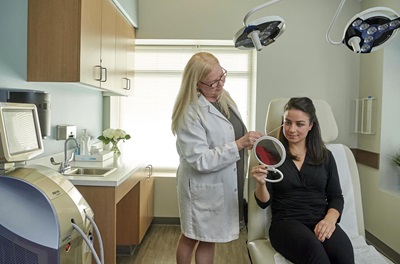 Patient receiving aesthetic treatment from Jeanne Vos at Penn Plastic Surgery Bryn Mawr